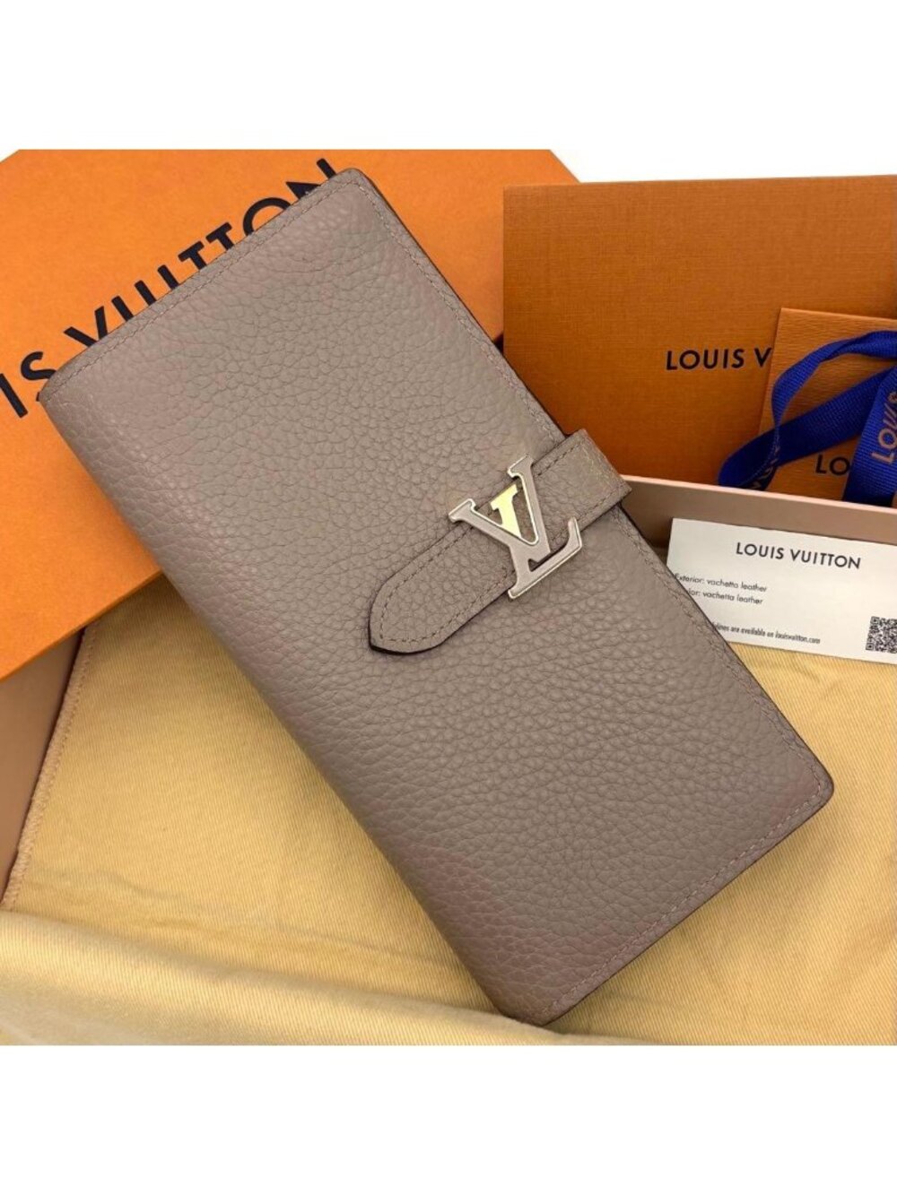 Louis Vuitton Taurillon LV Vertical Wallet Bifold